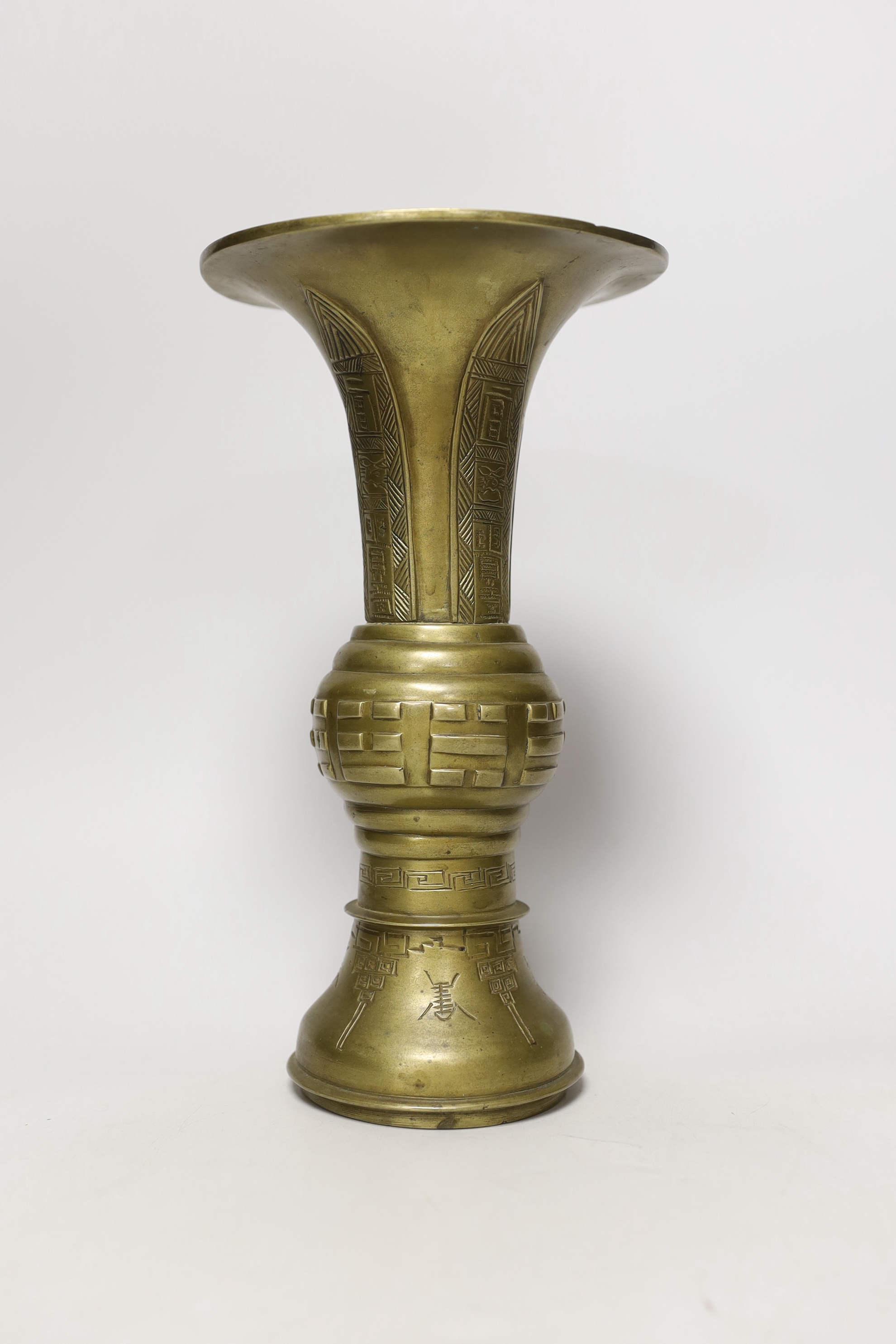 A Chinese bronze gu vase, early 20th century, 27.5cm tall